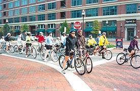 [photo, Bicycle riders, Market Place, Baltimore, Maryland]