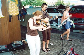 [photo, Street musicians near Baltimore Farmers' Market, Holliday St., Baltimore, Maryland]